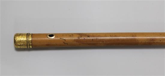 A 22ct gold mounted malacca cane dated 1774 by Lawrence Johnson,